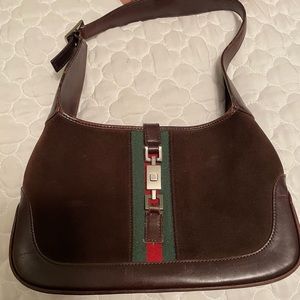 Authentic Gucci brown suede bag with Gucci stripe and metal clasp front